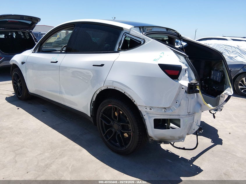 2023 Tesla Model y VIN 7SAYGDEE4PA076343 IAAI salvage auction — FRONT & REAR, Original (Texas), sold $9,050 on 2026-07-07 (photo 3)