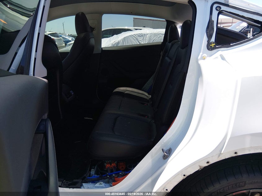 2023 Tesla Model y VIN 7SAYGDEE4PA076343 IAAI salvage auction — FRONT & REAR, Original (Texas), sold $9,050 on 2026-07-07 (photo 8)