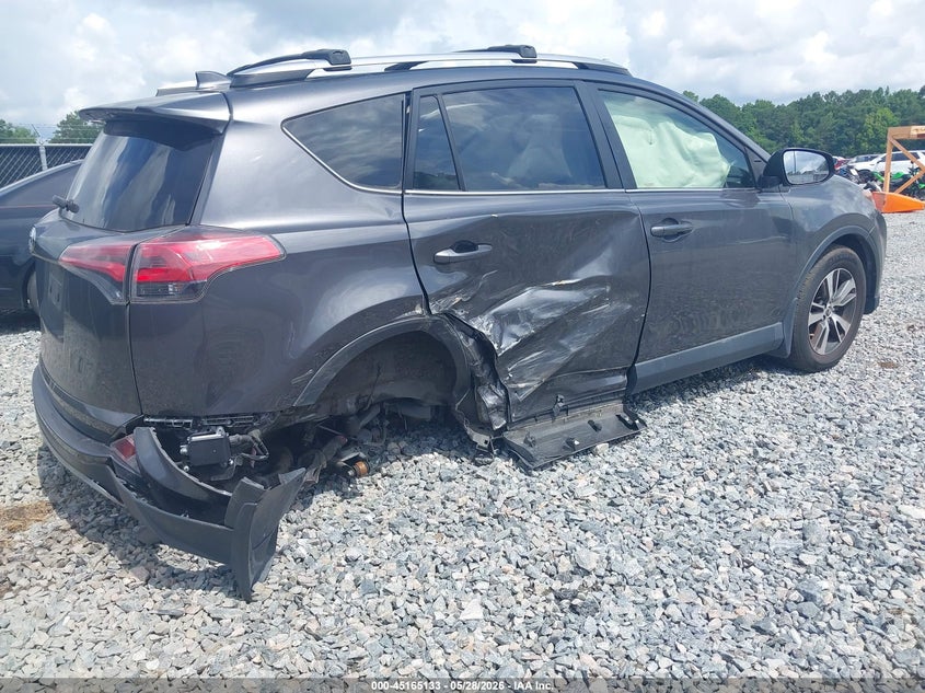 2017 Toyota Rav 4 VIN JTMRFREV1HJ712229 IAAI salvage auction — NORMAL WEAR, Clear (Georgia), sold $5,600 on 2026-07-13 (photo 4)
