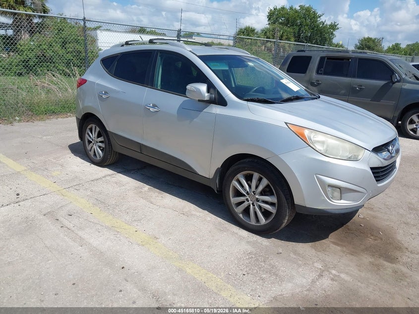 2012 Hyundai Tucson VIN KM8JU3AC9CU404054 IAAI salvage auction — LEFT FRONT, Clear (Florida), sold $1,125 on 2026-07-15 (photo 1)