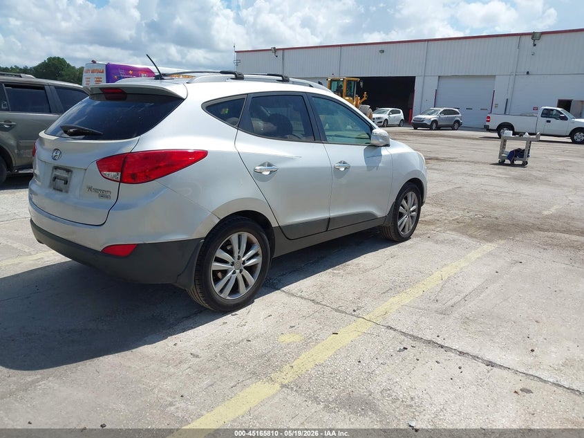 2012 Hyundai Tucson VIN KM8JU3AC9CU404054 IAAI salvage auction — LEFT FRONT, Clear (Florida), sold $1,125 on 2026-07-15 (photo 4)