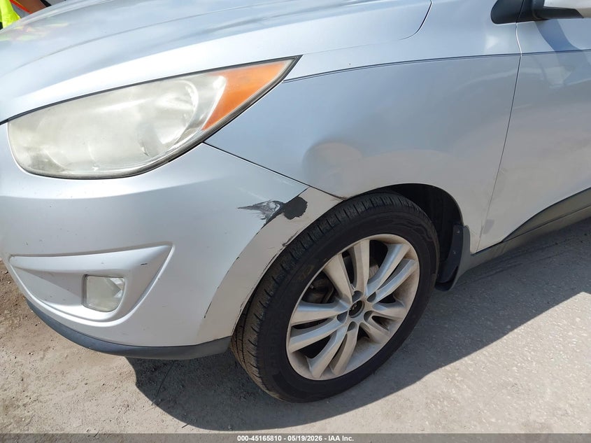 2012 Hyundai Tucson VIN KM8JU3AC9CU404054 IAAI salvage auction — LEFT FRONT, Clear (Florida), sold $1,125 on 2026-07-15 (photo 6)