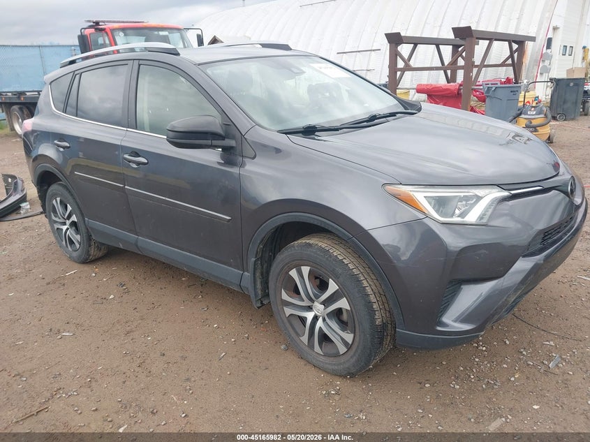 2018 Toyota Rav 4 VIN JTMZFREV7JJ744026 IAAI salvage auction — LEFT REAR, Salvage (Montana), sold $6,900 on 2026-07-15 (photo 1)