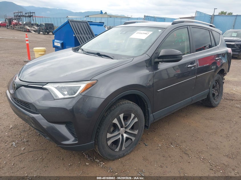 2018 Toyota Rav 4 VIN JTMZFREV7JJ744026 IAAI salvage auction — LEFT REAR, Salvage (Montana), sold $6,900 on 2026-07-15 (photo 2)