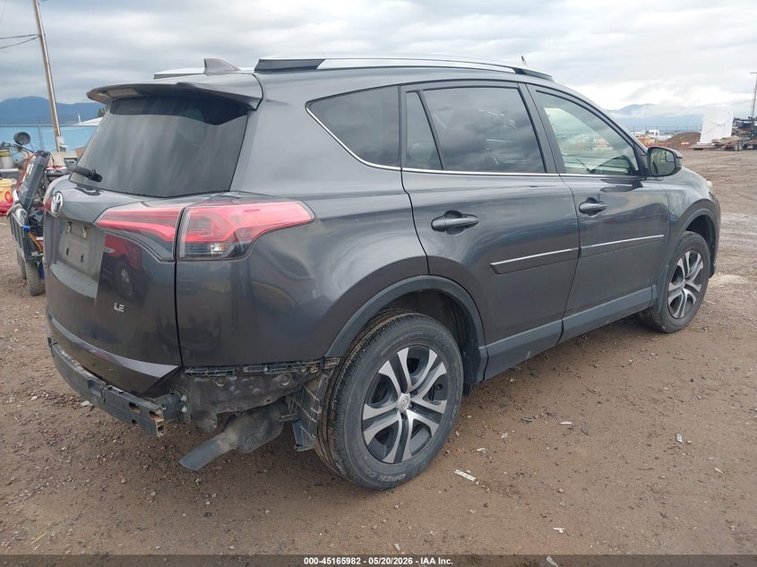 2018 Toyota Rav 4 VIN JTMZFREV7JJ744026 IAAI salvage auction — LEFT REAR, Salvage (Montana), sold $6,900 on 2026-07-15 (photo 4)