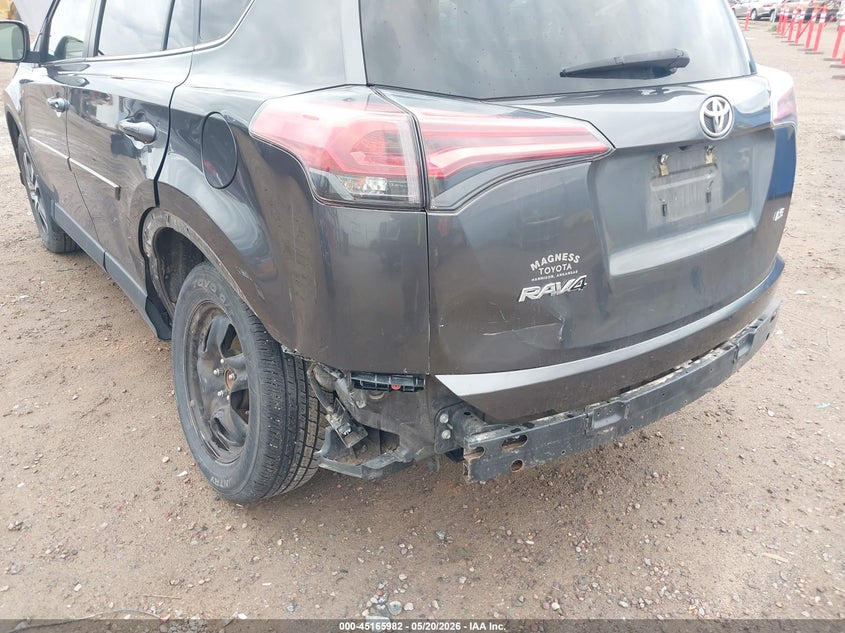 2018 Toyota Rav 4 VIN JTMZFREV7JJ744026 IAAI salvage auction — LEFT REAR, Salvage (Montana), sold $6,900 on 2026-07-15 (photo 6)
