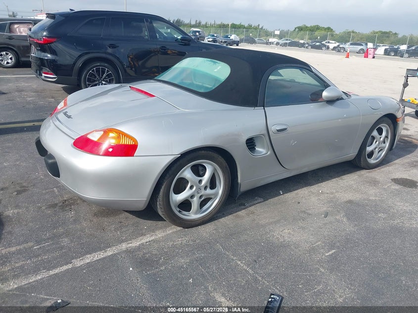 1997 Porsche Boxster VIN WP0CA2986VS622029 IAAI salvage auction — WATER/FLOOD, Rebuildable (Florida), sold $1,000 on 2026-07-09 (photo 4)