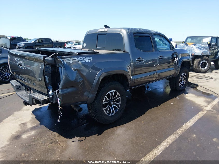 2021 Toyota Tacoma VIN 5TFCZ5ANXMX254449 IAAI salvage auction — ROLLOVER, Salvage (North Carolina), sold $8,700 on 2026-07-29 (photo 4)