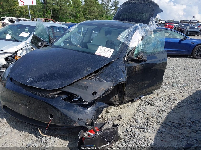 2021 Tesla Model y VIN 5YJYGDEF4MF257687 IAAI salvage auction — ALL OVER, Salvage (Georgia), sold $2,450 on 2026-07-28 (photo 2)