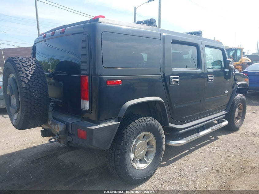 2006 Hummer H2 VIN 5GRGN23U86H121717 IAAI salvage auction — NORMAL WEAR, Clear (Michigan), sold $2,150 on 2026-07-09 (photo 4)