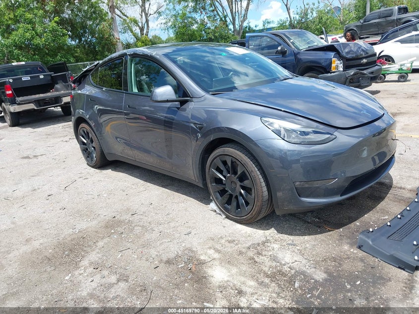2023 Tesla Model y VIN 7SAYGAEE5PF854991 IAAI salvage auction — REAR END, Rebuildable (Florida), sold $9,200 on 2026-07-23 (photo 1)