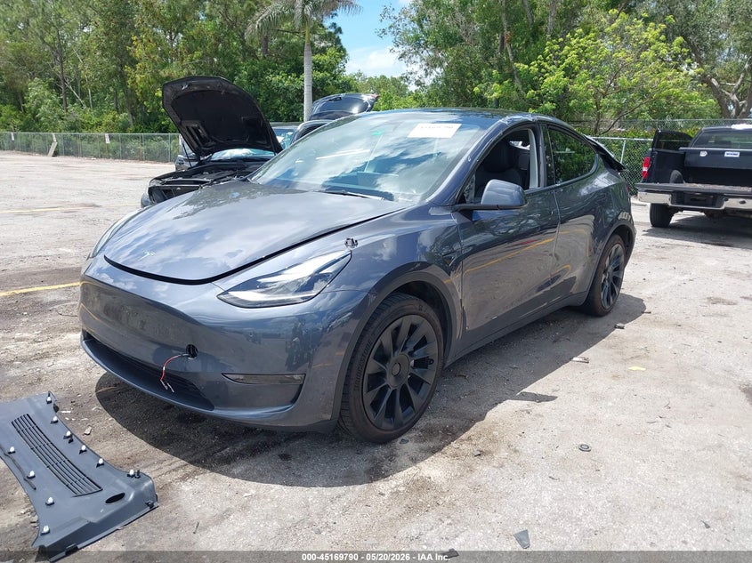 2023 Tesla Model y VIN 7SAYGAEE5PF854991 IAAI salvage auction — REAR END, Rebuildable (Florida), sold $9,200 on 2026-07-23 (photo 2)