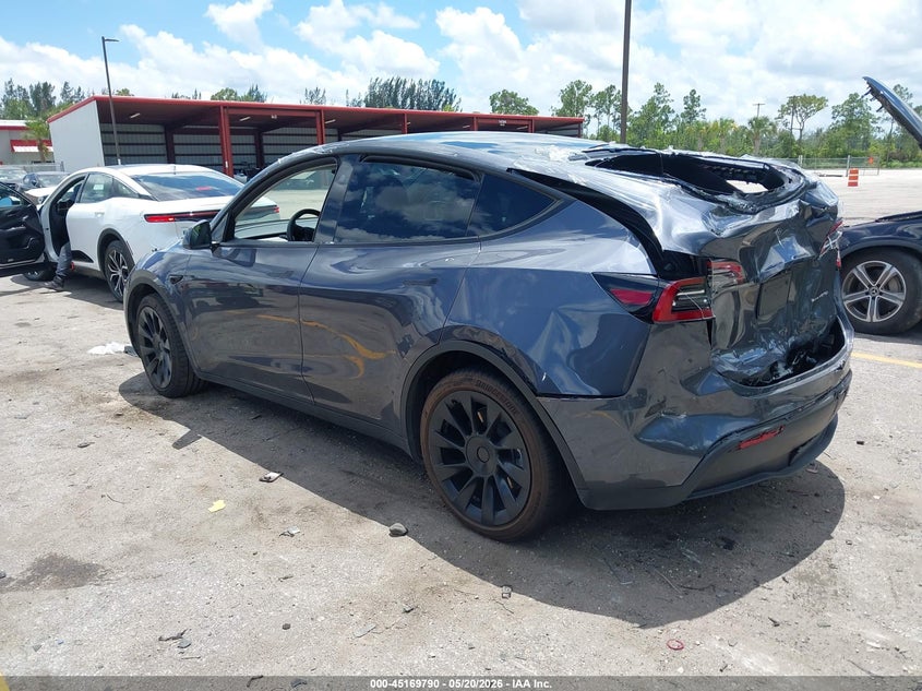 2023 Tesla Model y VIN 7SAYGAEE5PF854991 IAAI salvage auction — REAR END, Rebuildable (Florida), sold $9,200 on 2026-07-23 (photo 3)