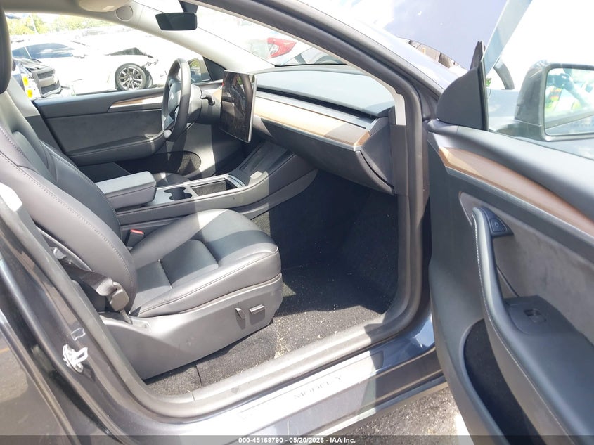 2023 Tesla Model y VIN 7SAYGAEE5PF854991 IAAI salvage auction — REAR END, Rebuildable (Florida), sold $9,200 on 2026-07-23 (photo 5)