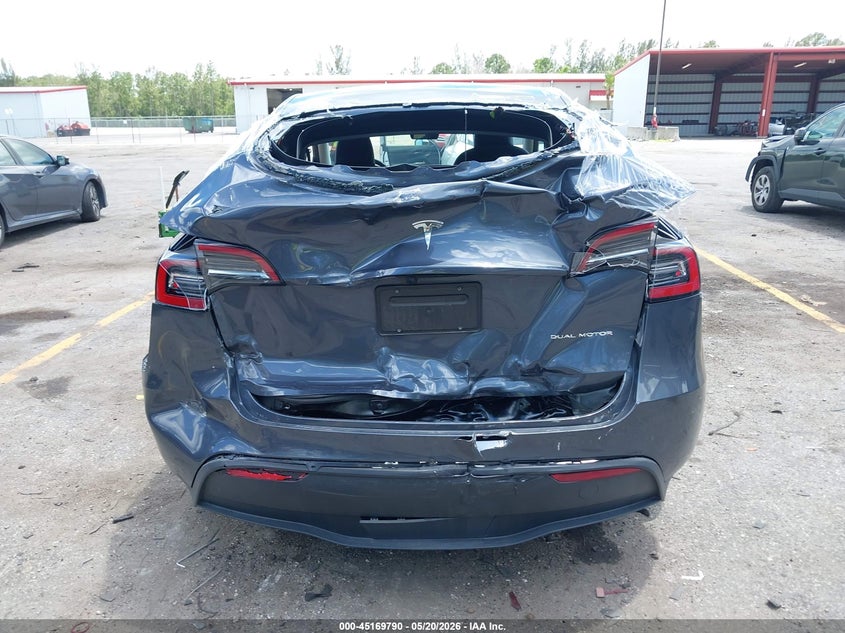 2023 Tesla Model y VIN 7SAYGAEE5PF854991 IAAI salvage auction — REAR END, Rebuildable (Florida), sold $9,200 on 2026-07-23 (photo 6)