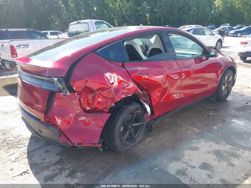 2026 Tesla Model y VIN 7SAYGDEE9TA431789 IAAI salvage auction — RIGHT REAR, Salvage (Missouri), sold $18,500 on 2026-07-08 (photo 4)