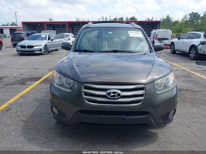 2012 Hyundai Santa fe VIN 5XYZHDAG6CG128745 IAAI salvage auction — NORMAL WEAR, Clear (Florida), sold $525 on 2026-07-27 (photo 6)