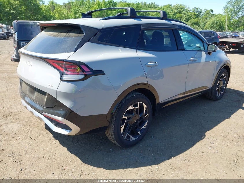 2024 Kia Sportage VIN 5XYK5CDF4RG159959 IAAI salvage auction — SIDE, Salvage (Idaho), sold $10,700 on 2026-07-10 (photo 4)