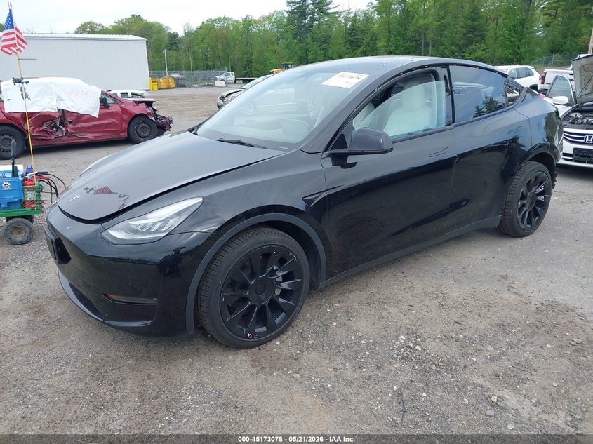 2022 Tesla Model y VIN 7SAYGDEE2NF318403 IAAI salvage auction — REAR END, Salvage Title, sold $8,600 on 2026-07-24 (photo 2)