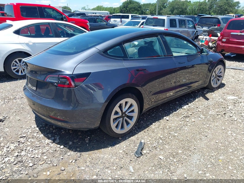 2023 Tesla Model 3 VIN 5YJ3E1EA7PF483939 IAAI salvage auction — LEFT SIDE, Salvage (Texas), sold $3,900 on 2026-07-09 (photo 4)