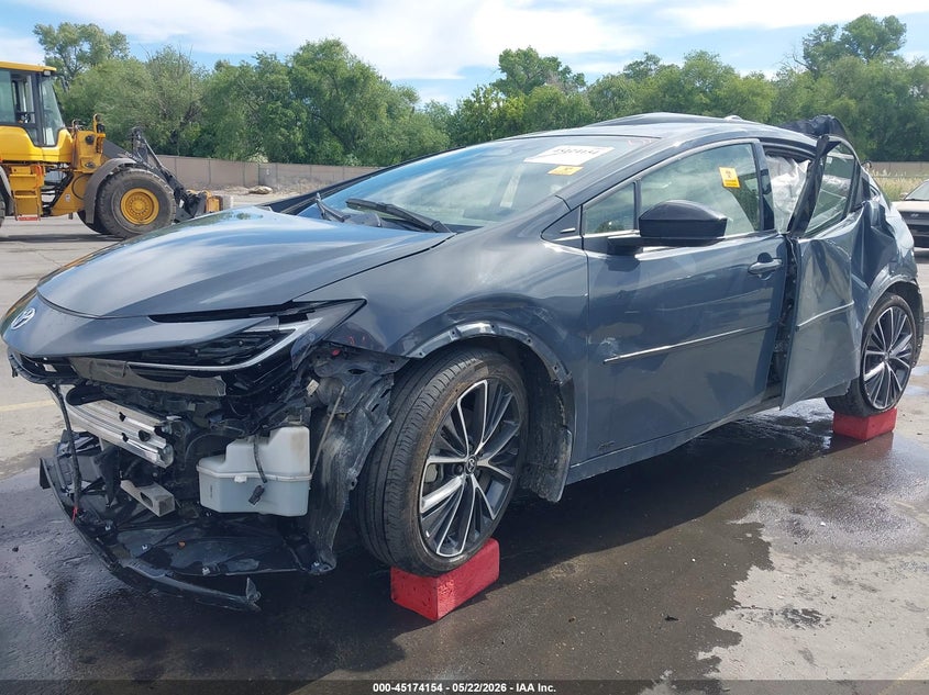 2024 Toyota Prius VIN JTDADABU6R3022899 IAAI salvage auction — FRONT & REAR, Salvage (Wyoming), sold $825 on 2026-07-23 (photo 2)