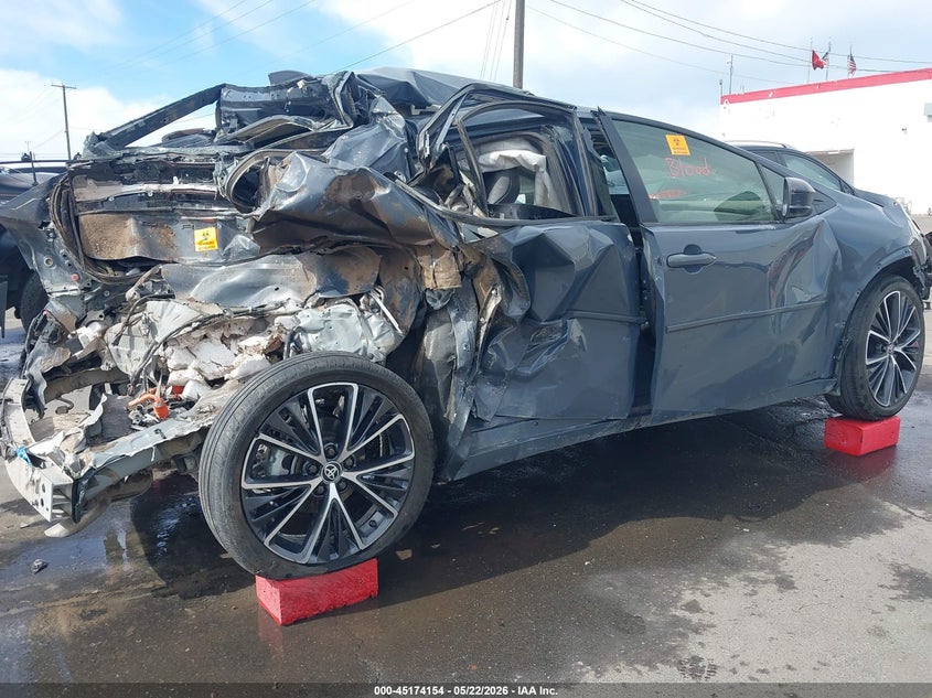 2024 Toyota Prius VIN JTDADABU6R3022899 IAAI salvage auction — FRONT & REAR, Salvage (Wyoming), sold $825 on 2026-07-23 (photo 4)