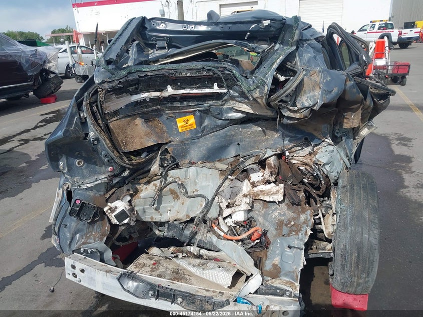2024 Toyota Prius VIN JTDADABU6R3022899 IAAI salvage auction — FRONT & REAR, Salvage (Wyoming), sold $825 on 2026-07-23 (photo 6)