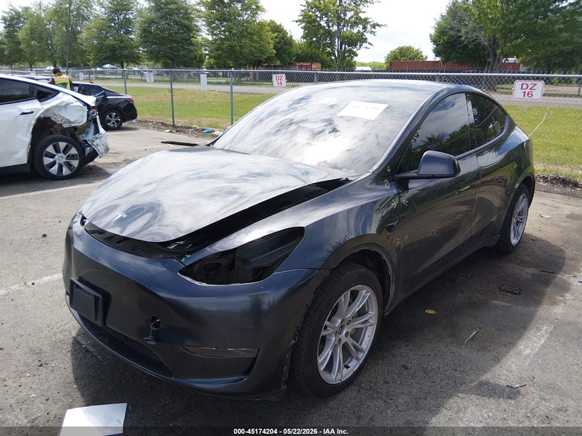 2024 Tesla Model y VIN 7SAYGDEDXRF016693 IAAI salvage auction — FRONT & REAR, Salvage (New Jersey), sold $10,225 on 2026-07-16 (photo 2)
