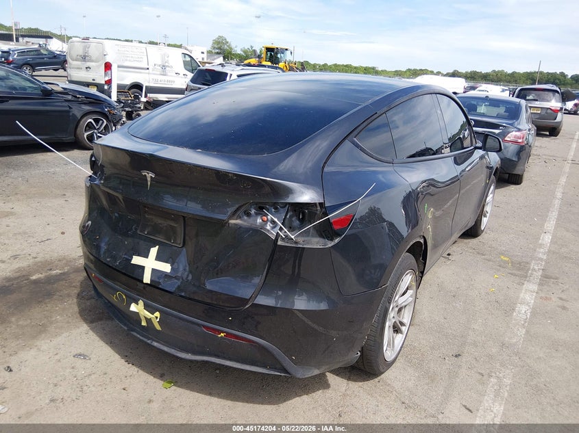2024 Tesla Model y VIN 7SAYGDEDXRF016693 IAAI salvage auction — FRONT & REAR, Salvage (New Jersey), sold $10,225 on 2026-07-16 (photo 4)
