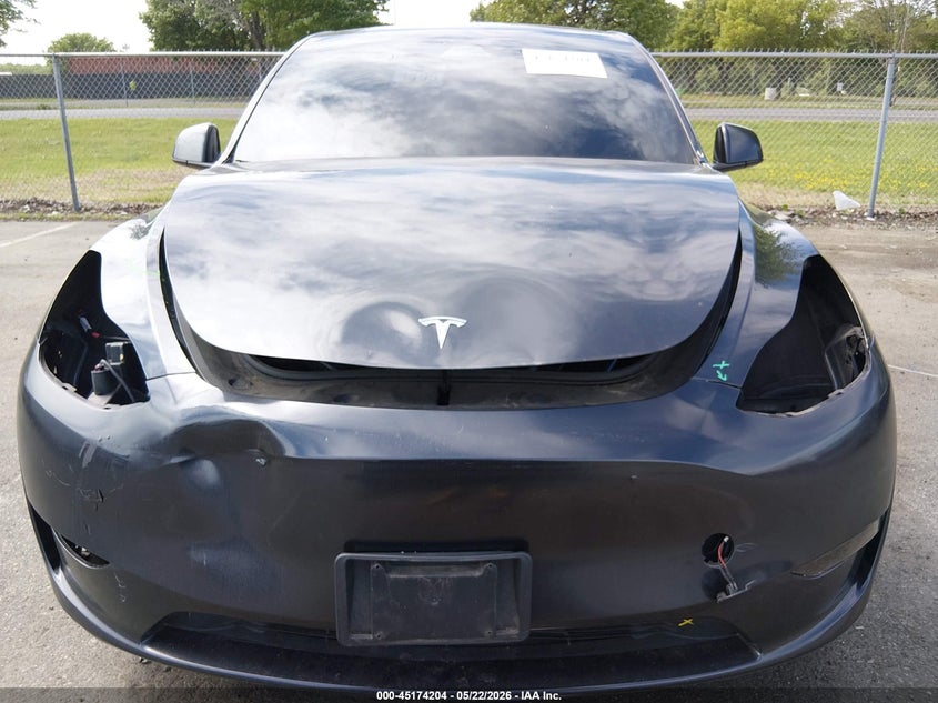 2024 Tesla Model y VIN 7SAYGDEDXRF016693 IAAI salvage auction — FRONT & REAR, Salvage (New Jersey), sold $10,225 on 2026-07-16 (photo 6)