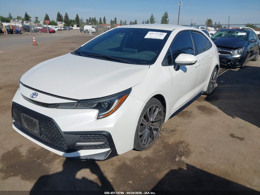 2020 Toyota Corolla VIN 5YFS4RCE2LP041085 IAAI salvage auction — SIDE, Salvage (California), sold $6,775 on 2026-07-07 (photo 2)