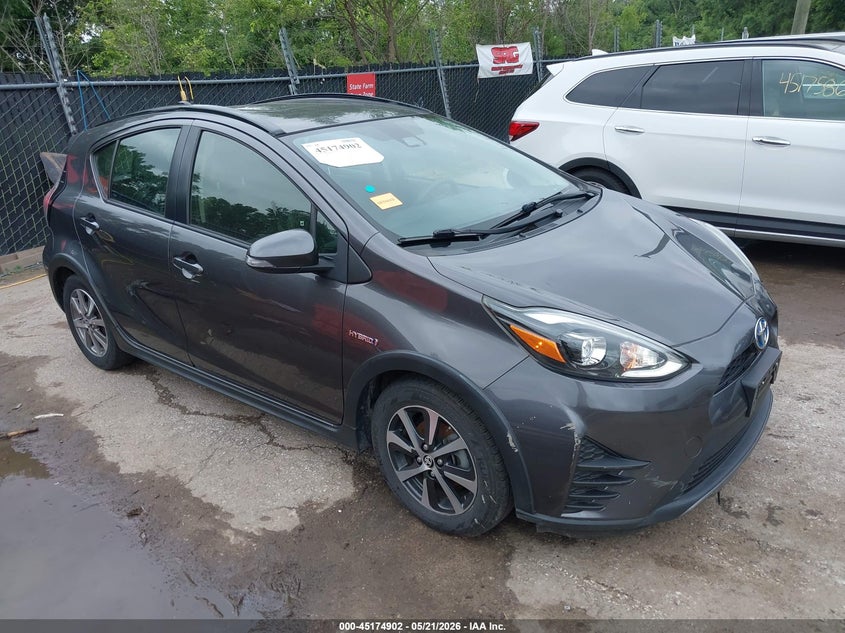2018 Toyota Prius c VIN JTDKDTB34J1607228 IAAI salvage auction — LEFT SIDE, Salvage (Kansas), sold $3,600 on 2026-07-15 (photo 1)