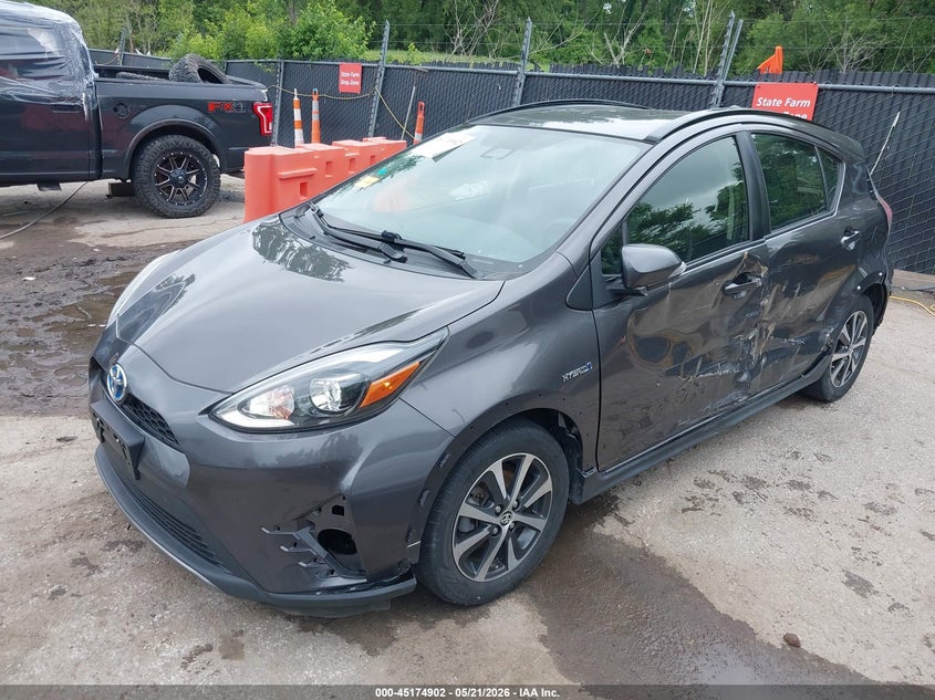 2018 Toyota Prius c VIN JTDKDTB34J1607228 IAAI salvage auction — LEFT SIDE, Salvage (Kansas), sold $3,600 on 2026-07-15 (photo 2)
