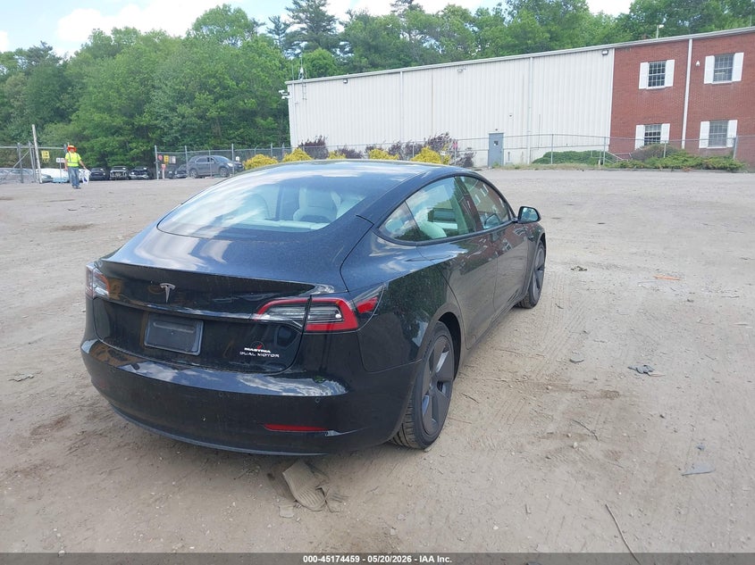 2021 Tesla Model 3 VIN 5YJ3E1EB9MF992807 IAAI salvage auction — LEFT FRONT, Salvage (Massachusetts), sold $9,400 on 2026-07-15 (photo 4)