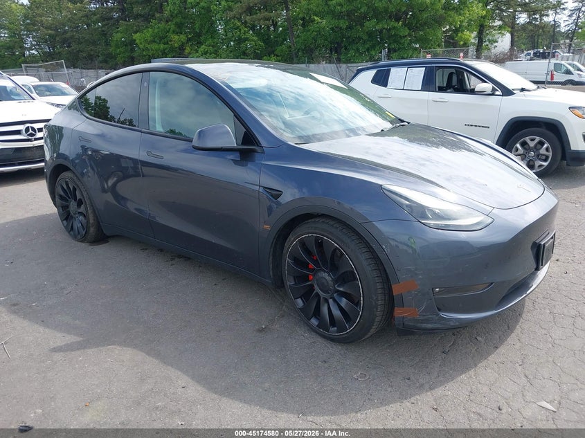 2022 Tesla Model y VIN 7SAYGDEF6NF533677 IAAI salvage auction — LEFT SIDE, Salvage Title, sold $12,400 on 2026-07-07 (photo 1)
