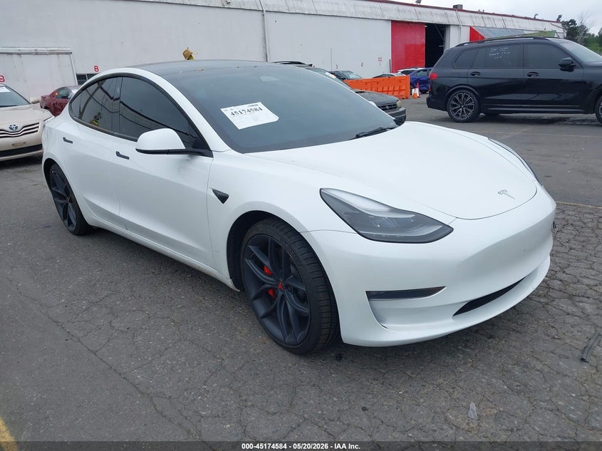 2023 Tesla Model 3 VIN 5YJ3E1EC6PF497980 IAAI salvage auction — LEFT SIDE, Salvage (Oregon), sold $13,200 on 2026-07-09 (photo 1)