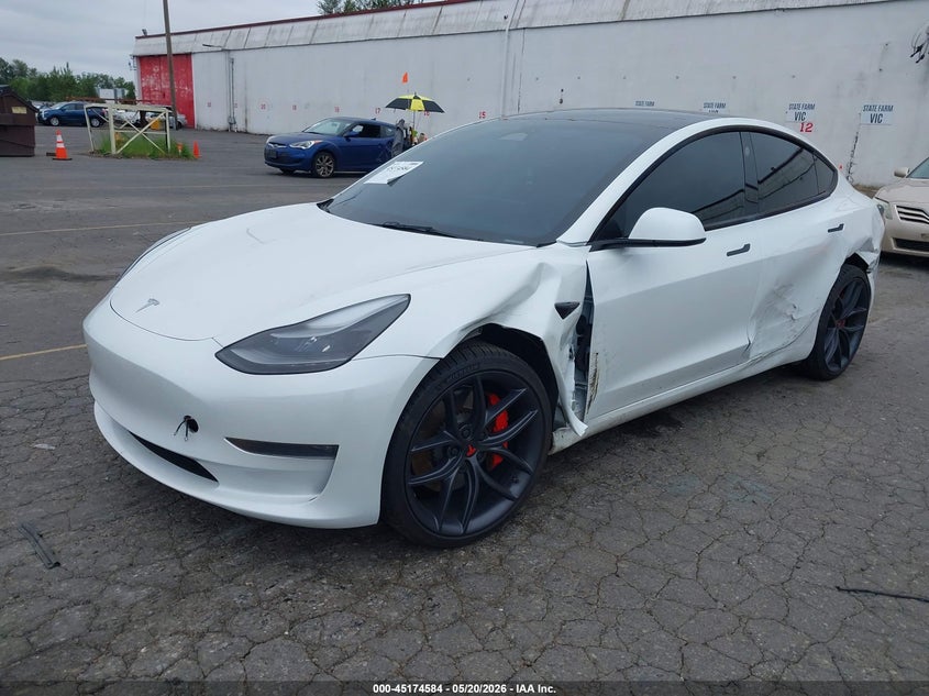 2023 Tesla Model 3 VIN 5YJ3E1EC6PF497980 IAAI salvage auction — LEFT SIDE, Salvage (Oregon), sold $13,200 on 2026-07-09 (photo 2)