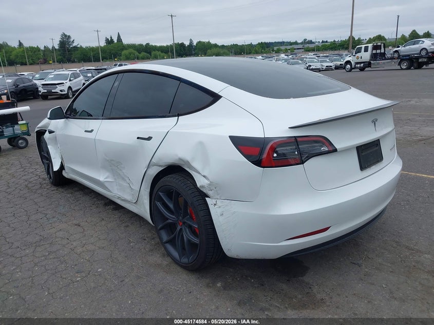 2023 Tesla Model 3 VIN 5YJ3E1EC6PF497980 IAAI salvage auction — LEFT SIDE, Salvage (Oregon), sold $13,200 on 2026-07-09 (photo 3)