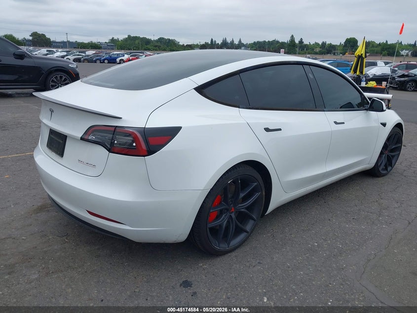 2023 Tesla Model 3 VIN 5YJ3E1EC6PF497980 IAAI salvage auction — LEFT SIDE, Salvage (Oregon), sold $13,200 on 2026-07-09 (photo 4)