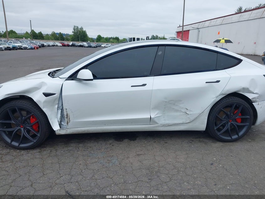 2023 Tesla Model 3 VIN 5YJ3E1EC6PF497980 IAAI salvage auction — LEFT SIDE, Salvage (Oregon), sold $13,200 on 2026-07-09 (photo 6)