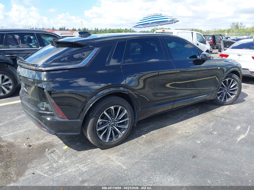 2025 Cadillac Lyriq VIN 1GYKPURK3SZ312323 IAAI salvage auction — SIDE, Rebuildable (Florida), sold $17,900 on 2026-07-16 (photo 4)