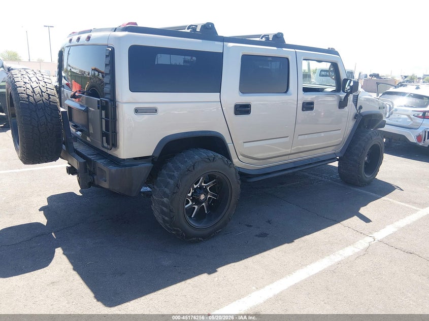 2003 Hummer H2 VIN 5GRGN23U83H147102 IAAI salvage auction — LEFT SIDE, Salvage (Nevada), sold $2,000 on 2026-07-24 (photo 4)