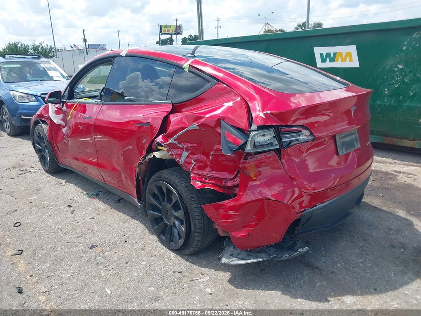 2023 Tesla Model y VIN 7SAYGDEE7PA129682 IAAI salvage auction — LEFT REAR, Salvage (Texas), sold $7,600 on 2026-07-16 (photo 3)