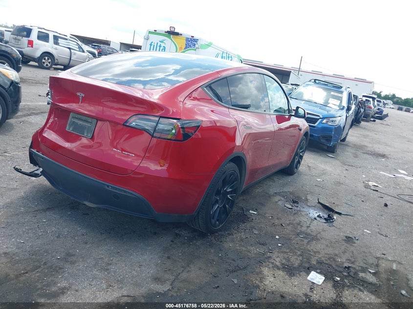 2023 Tesla Model y VIN 7SAYGDEE7PA129682 IAAI salvage auction — LEFT REAR, Salvage (Texas), sold $7,600 on 2026-07-16 (photo 4)