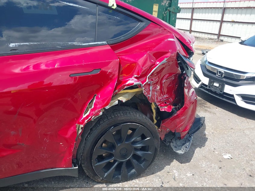 2023 Tesla Model y VIN 7SAYGDEE7PA129682 IAAI salvage auction — LEFT REAR, Salvage (Texas), sold $7,600 on 2026-07-16 (photo 6)