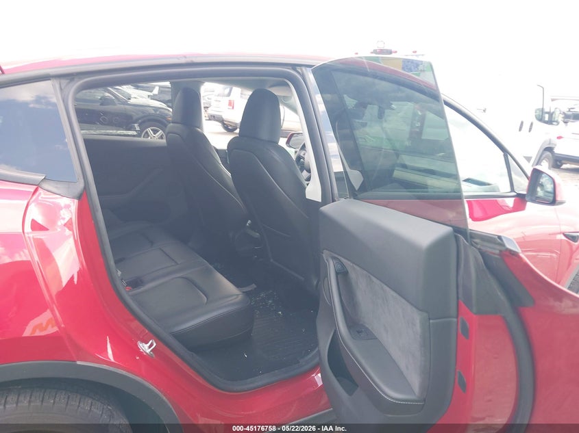 2023 Tesla Model y VIN 7SAYGDEE7PA129682 IAAI salvage auction — LEFT REAR, Salvage (Texas), sold $7,600 on 2026-07-16 (photo 8)
