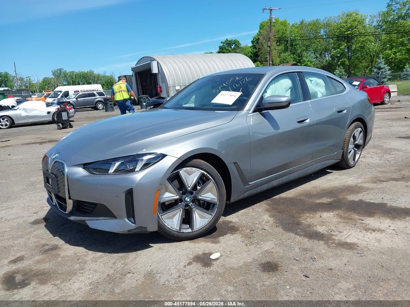 2025 BMW VIN WBY43HD00SFU16338 IAAI salvage auction — SIDE, Salvage Title, sold $13,400 on 2026-07-23 (photo 2)