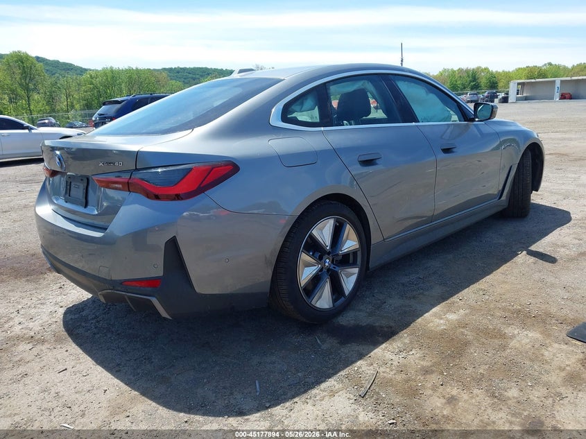2025 BMW VIN WBY43HD00SFU16338 IAAI salvage auction — SIDE, Salvage Title, sold $13,400 on 2026-07-23 (photo 4)