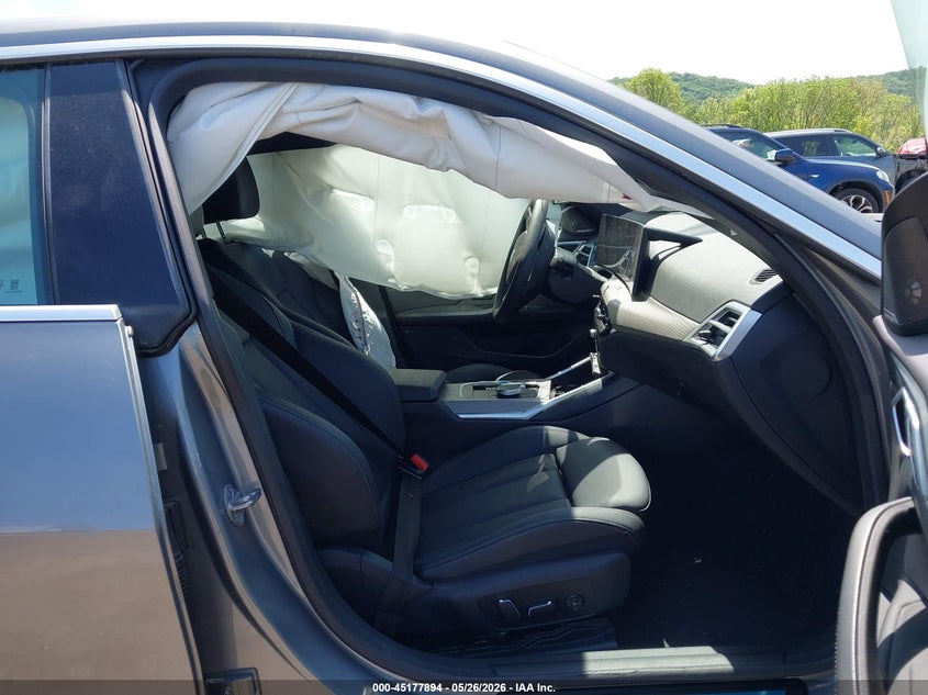 2025 BMW VIN WBY43HD00SFU16338 IAAI salvage auction — SIDE, Salvage Title, sold $13,400 on 2026-07-23 (photo 5)