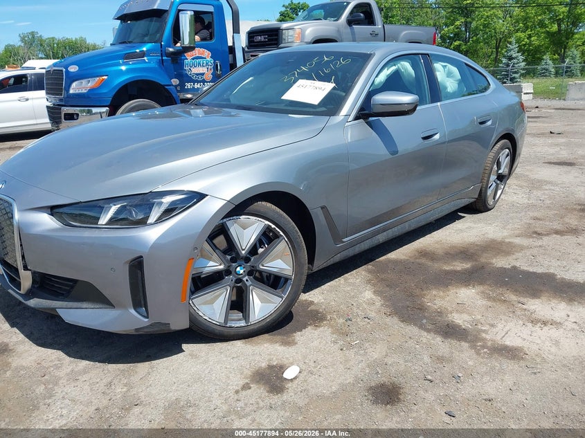 2025 BMW VIN WBY43HD00SFU16338 IAAI salvage auction — SIDE, Salvage Title, sold $13,400 on 2026-07-23 (photo 6)